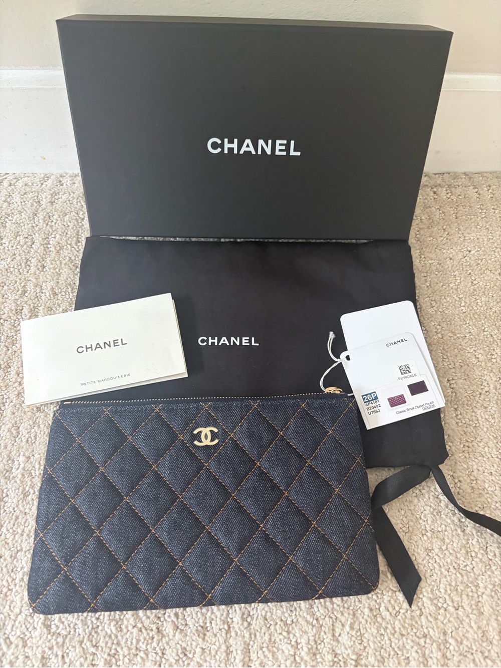 CHANEL Quilted Blue Denim Pouch with Gold CC